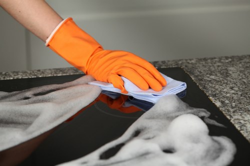 Carpet cleaning team preparing equipment with safety checks