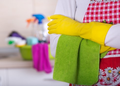 Cleaning team managing waste and site safety procedures
